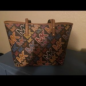 Brand new Micheal Kors multi color bag.